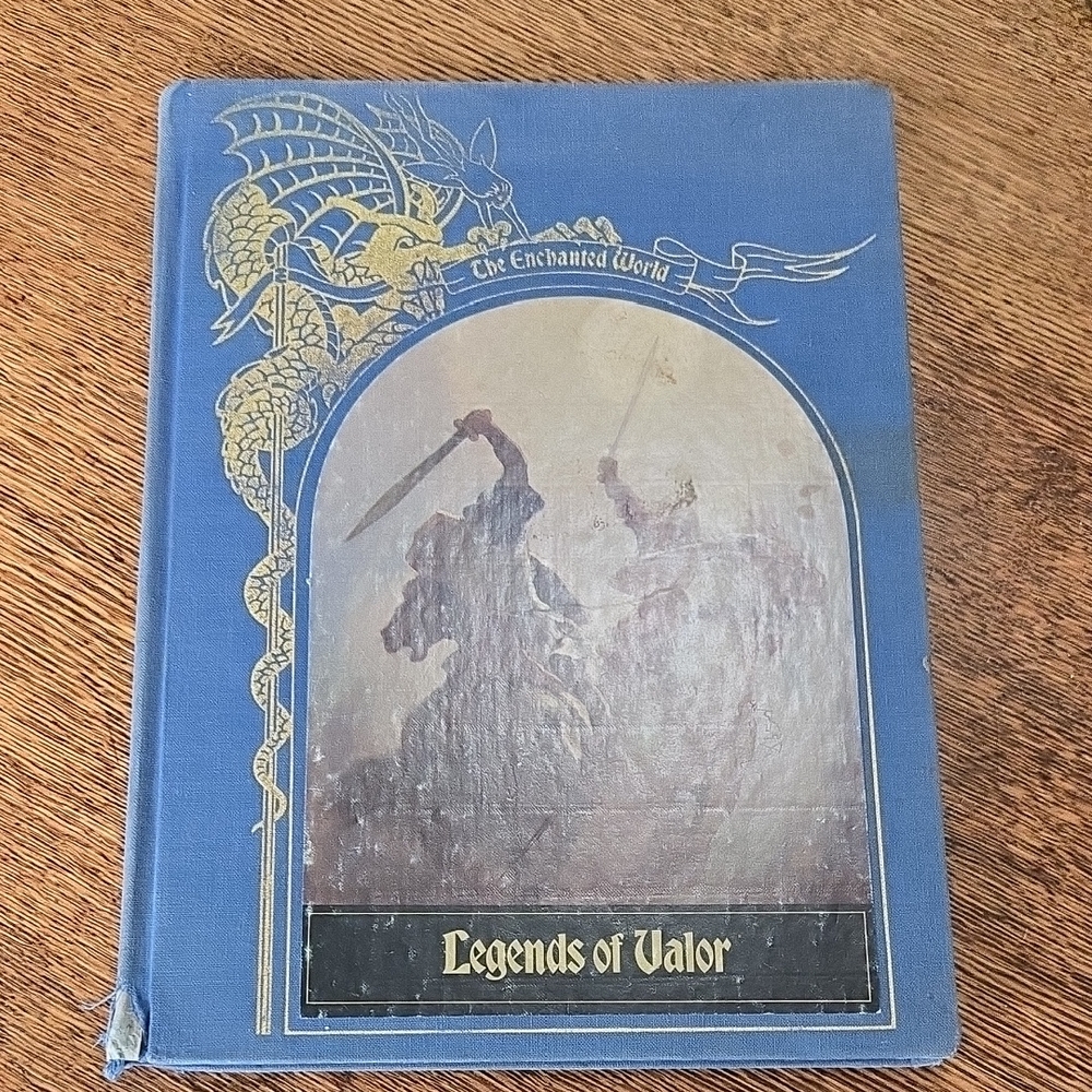 FREE WITH THE PURCHASE OF A SECOND BOOK The Enchanted World Legends Of Valor